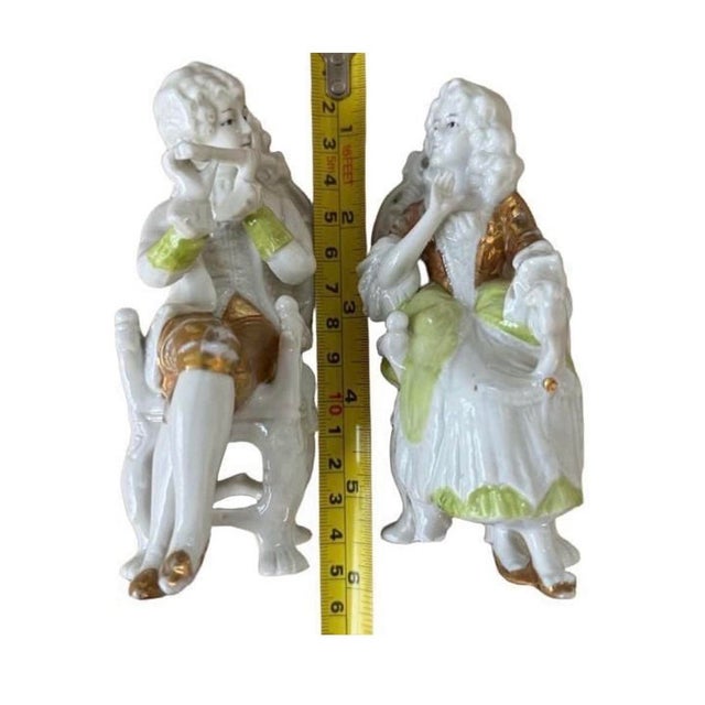 An exceptionally scarce matching pair of antique German porcelain courting figures, model 11982, attributed to Unger,...