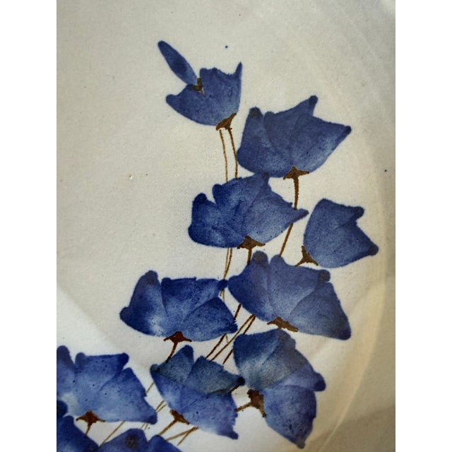 Here is a large, statement vintage studio pottery platter, likely dating to the later mid-century. The piece features a...