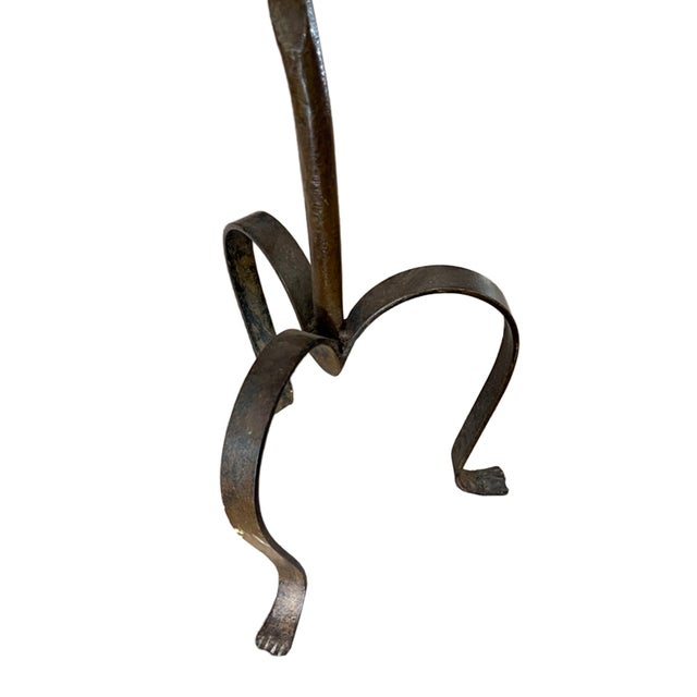 Elegant and practical - this decorative martini table was made in France in the 1960s. Lovely detail of simple paw feet...