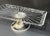 Add a touch of glamour to your table with this hand-assembled rectangular serving stand, combining a crystal-clear...