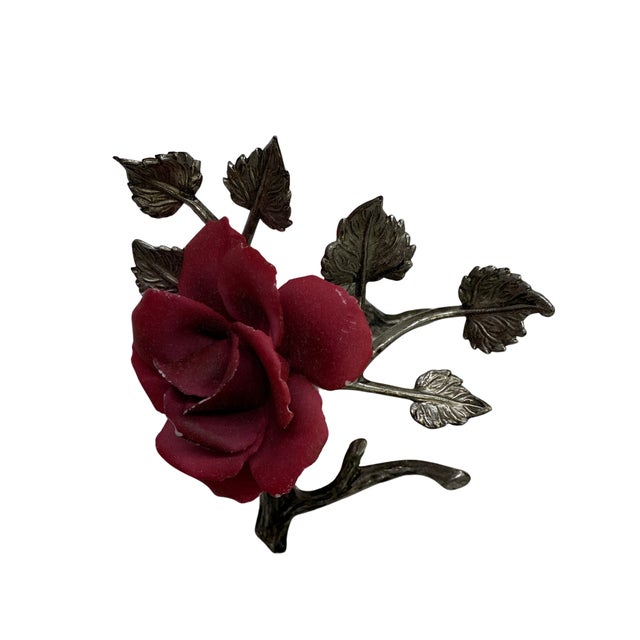 Elegant vintage Italian Capodimonte porcelain floral sculpture featuring a richly colored burgundy rose mounted on a...