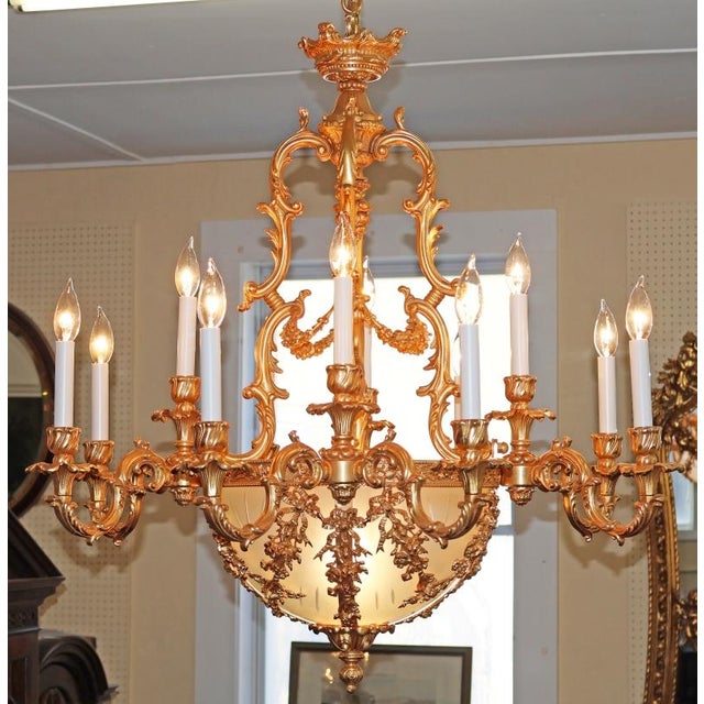Italian FBAI Gold Gilt Bronze & Crystal 12 Light Louis XV Style Chandelier Dimensions : 34" Tall X 32" Wide X 32" Deep An...