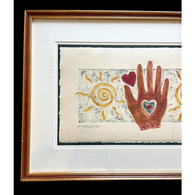 The product is a beautifully framed, signed artist’s proof watercolor art print by Liz Lyons Friedman titled 'with heart...