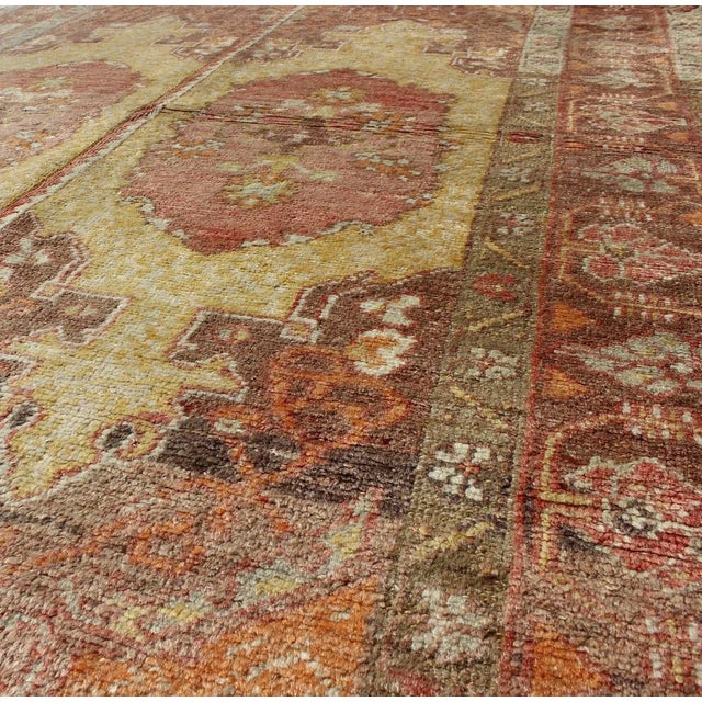 1930s Vintage Oushak Rug With Two Medallion Panels in Yellow, Brown, Orange and Soft Red For Sale - Image 5 of 6