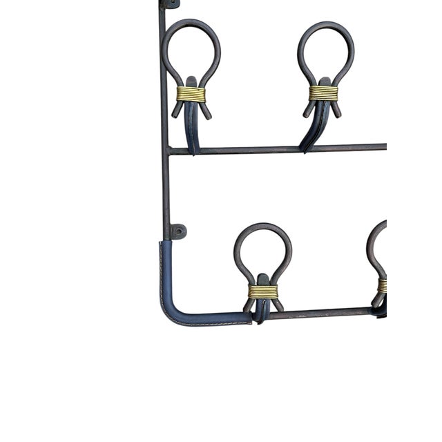 Vintage Stitched Leather Coat Rack by Jacques Adnet, 1950s, in Very Good conditions. Designed 1950 to 1959 This piece has...