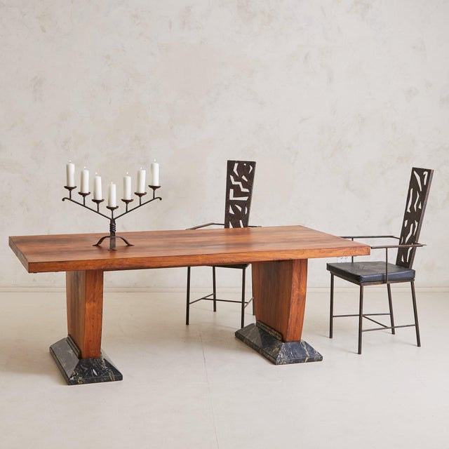A monumental French Art Deco dining table or desk from the 1940s, sourced in the South of France. The solid wood...
