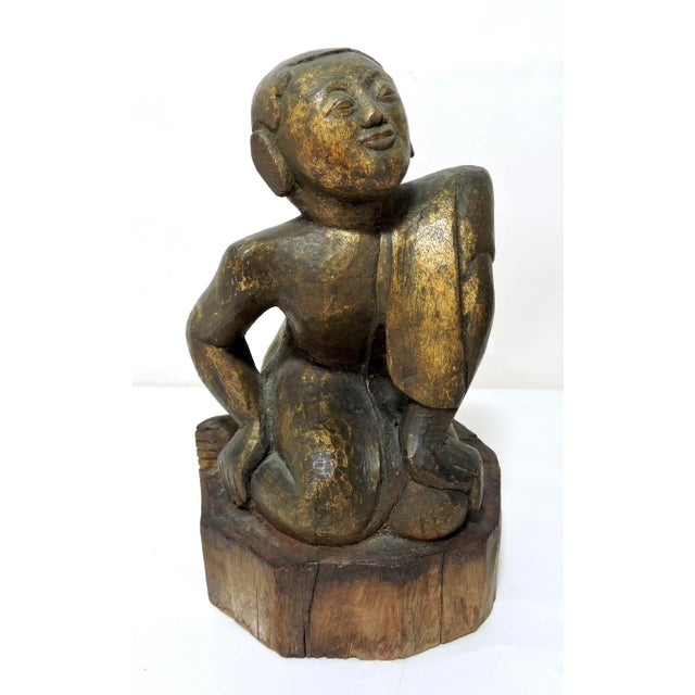 Appealing antique Burmese monk hand carved from wood in Burma/Myanmar, end of the 19th. Century, possibly early 20th. He...