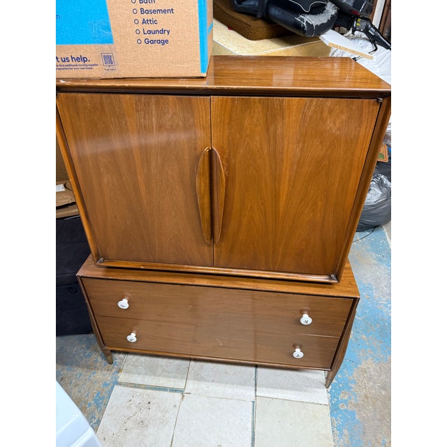 Vintage John Cameron Distinctive Furniture mid-century modern highboy dresser / gentleman’s chest featuring sculpted wood...