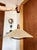 Striking mid-century pendant light by German-Swiss manufacturer Temde Leuchten, dating to the 1960s. The large conical...