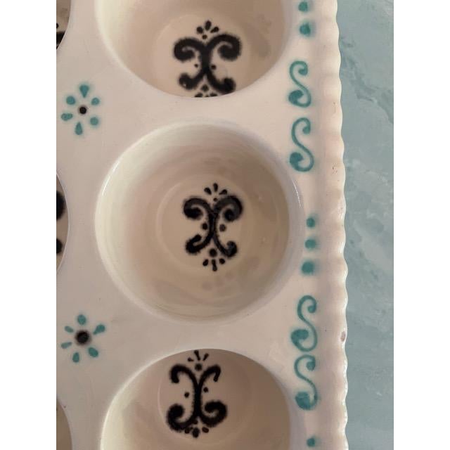 Gorgeous hand-painted muffin tin baking dish. Made in Portugal of terracotta ceramic. Turquoise and black decor. Heavy and...