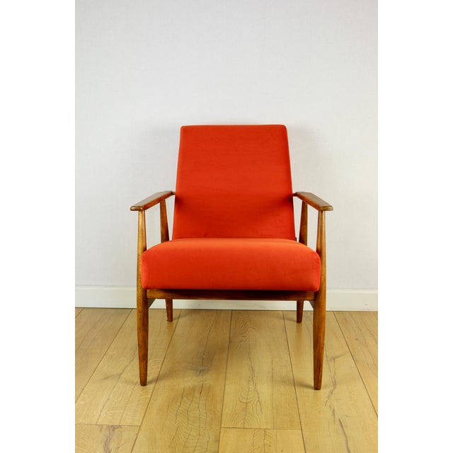 Armchair 'Lis', 1970s design by Henryk Lis, orange colour. 2 pieces available. Restored Henryk Lis armchair from 1970,...