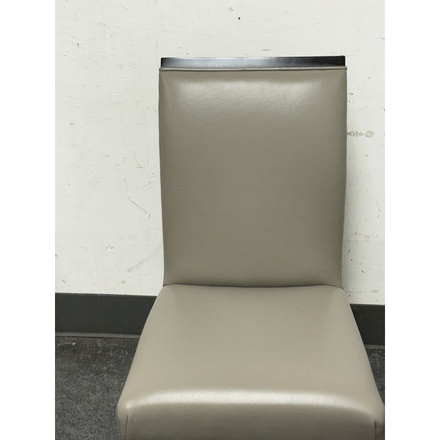 Design Plus Gallery presents a Vibe Dining Chair from Swaim Fine Furniture. This contemporary chair pairs a softly curved...