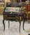 Bring timeless European elegance into your home with this magnificent French Louis XV roll top secretary desk. Expertly...