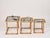 Stunning and unique set of three mid-century nesting tables entirely crafted in rattan, solid brass and hand-woven wicker...