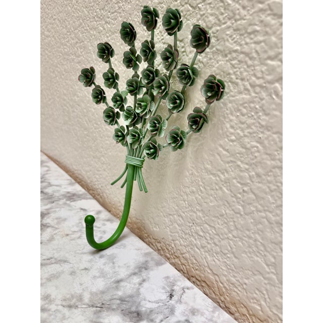 Vintage texture bouquet of flowers in a teal color. Cheerful wall hook for any bathroom or wall accent.