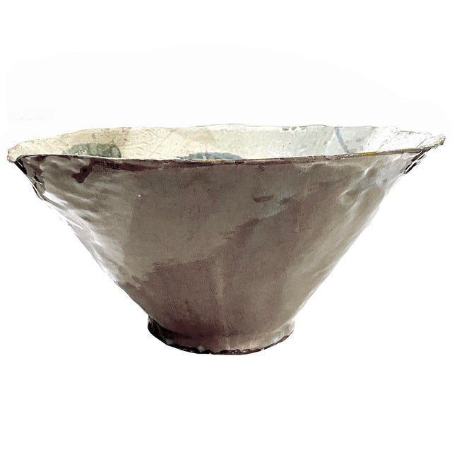 High impact and bold X-Large studio pottery slab bowl. Its exterior features an embossed linen texture glazed in in a warm...