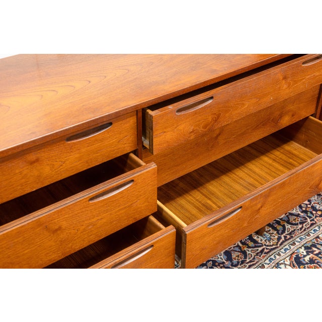 A vintage lowboy dresser by Ib Kofod Larsen for J. Clausen & Son Brande Mobelfabrik. This gorgeous 1960s mid century...