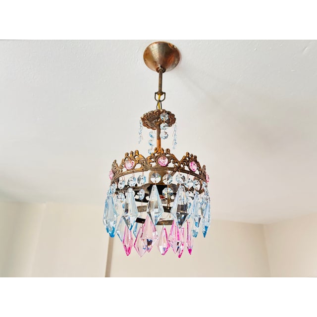 French Vintage Brass Crown Chandelier With Hand-Painted Pink and Ice Blue Crystal Prisms For Sale - Image 3 of 17