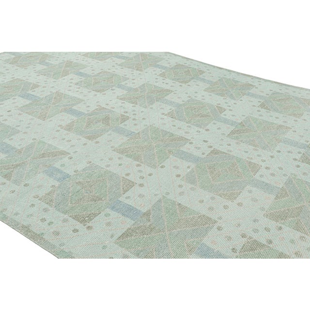 Made with hand-knotted wool, this 10x14 contemporary rug is an exciting new addition to Rug & Kilim’s Scandinavian rug...