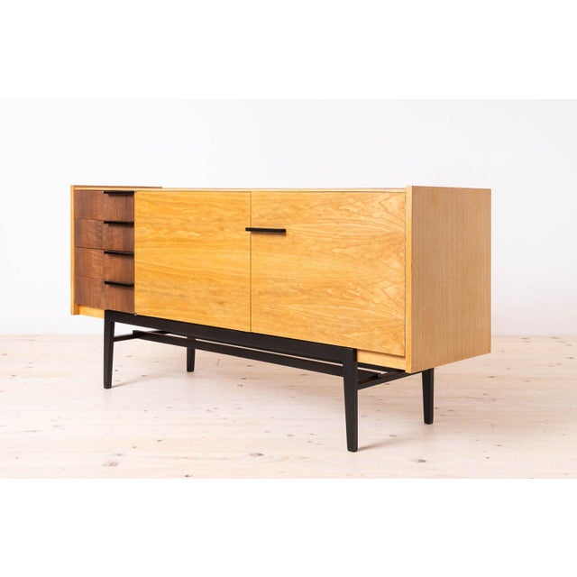 This exquisite sideboard, crafted in the 1960s in former czechoslovakia, exemplifies the epitome of mid-century modern...