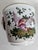 Charming Porcelain cachepots beautifully painted with exotic birds and bugs, with a classical face handles. These are tiny...