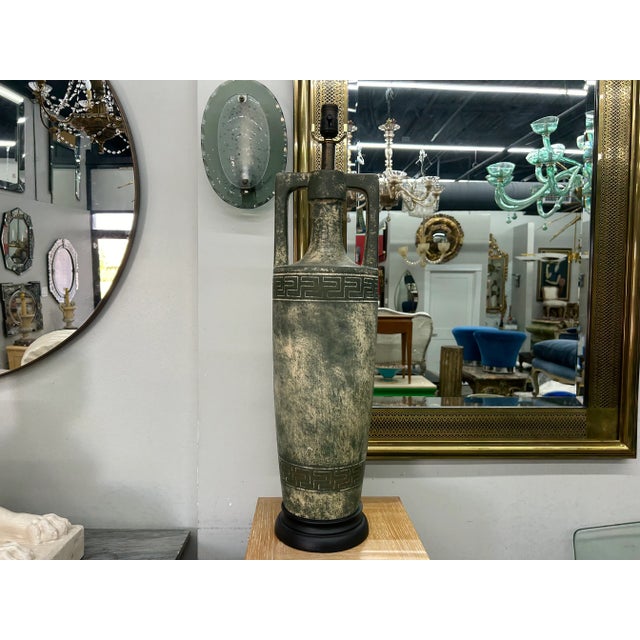 Pair Of Hollywood Regency Grecian Inspired Lamps. These handsome large mid century lamps are inspired by an ancient Greek...
