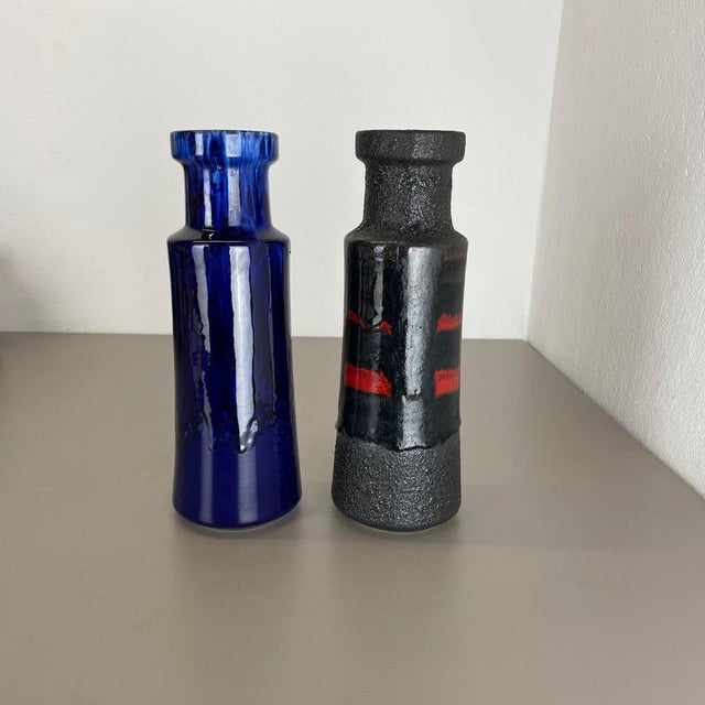 Article: Set of two fat lava art vases. Producer: Scheurich, Germany. Decade: 1970s .These original vintage vases was...