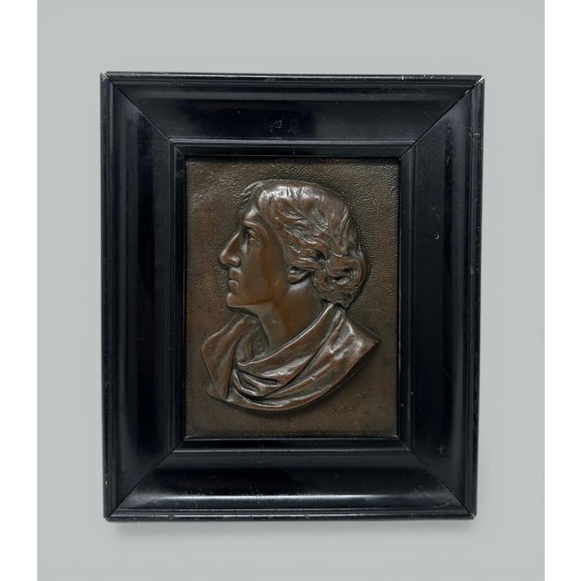 Stunning Example of a Neoclassical Bronze Portrait Plaque, superbly cast in high relief, complete with its original...