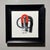 This oil on board piece features a striking depiction of a red magnet against a minimalist background, emphasizing the...