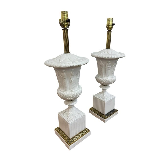These Antique Wedgwood Faux Marble Base Brass Neoclassical Table Lamps are a set of 2 elegant and stylish additions to any...