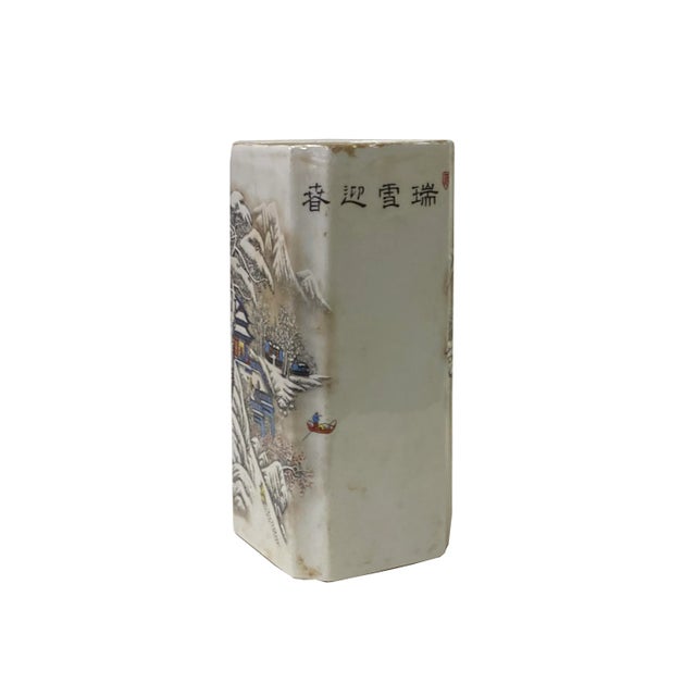 This is an oriental Chinese vase with a distressed off-white base and oriental snow trees house scenery graphics. Not...
