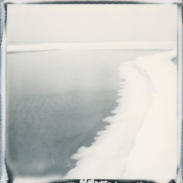 Nida No.3 is an original black and white Polaroid photograph captured on SX-70 film along the Baltic coastline of...