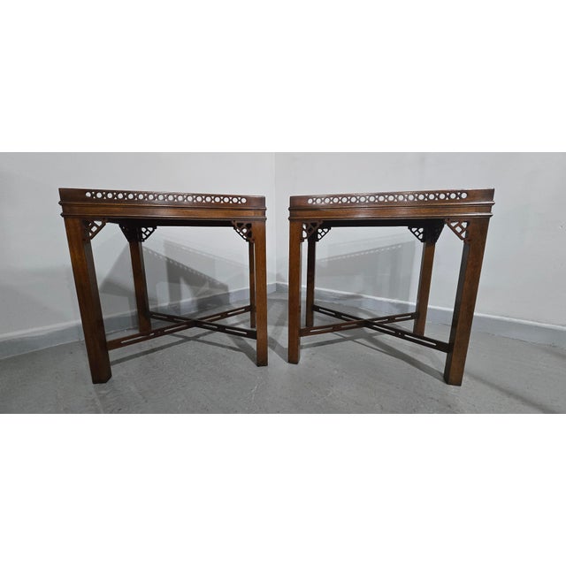A very good pair of Chippendale style mahogany side tables, pierced gallery with pierced cross stretchers, excellent...