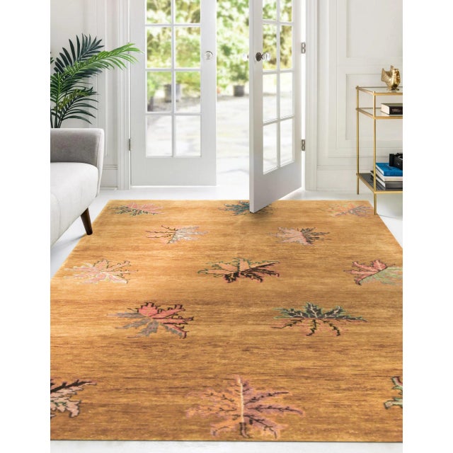 Isla Willow Brown Hand Knotted Wool Rug, Country of Origin: China. This exquisite transitional piece showcases the...