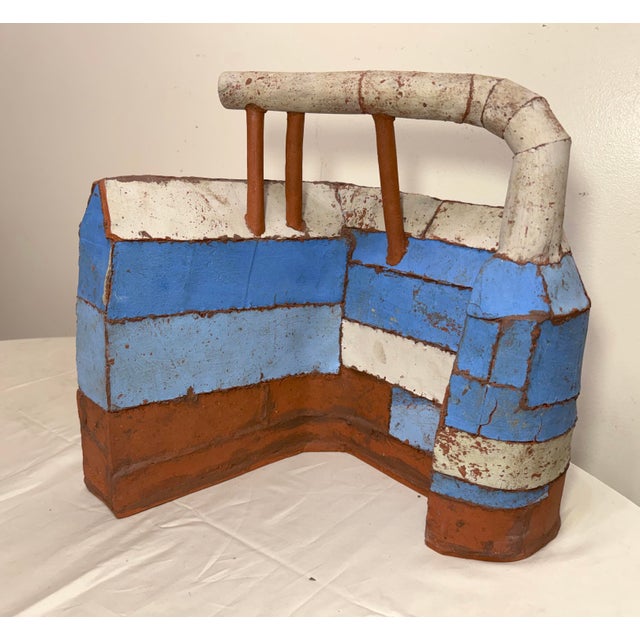 Steve Welch's American 20th/21st century L-shaped terracotta pottery sculpture is a large, original piece of abstract art....