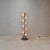 The present light is very rare and well preserved floor lamp, designed in the 1980's in Italy. Realized in four elements...