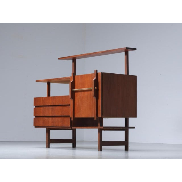 Geometrical Credenza in Wood and Brass, Italy 1960's This unique credenza combines playful geometric shapes with a...