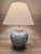 Ralph Lauren contemporary blue and white porcelain ginger jar table lamp with wood cap and base. The pattern features...