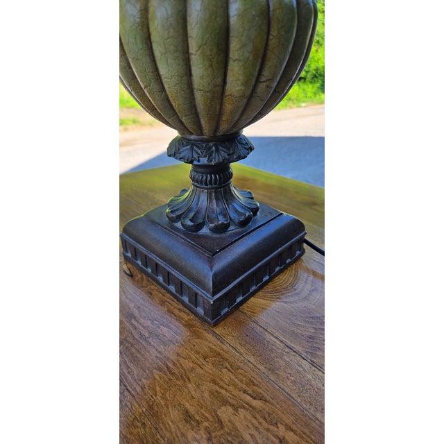 Description: Add timeless elegance to your home with this sophisticated vintage table lamp featuring a classic urn-style...