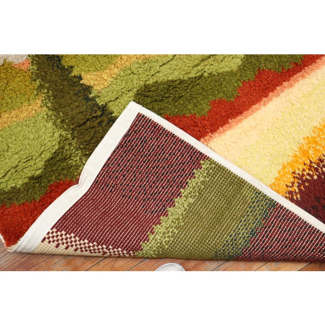 A late 20th century Swedish one of a kind machine made wool rug Measures: 4'9'' x 7'11'' Swedish Rya rugs are extremely...