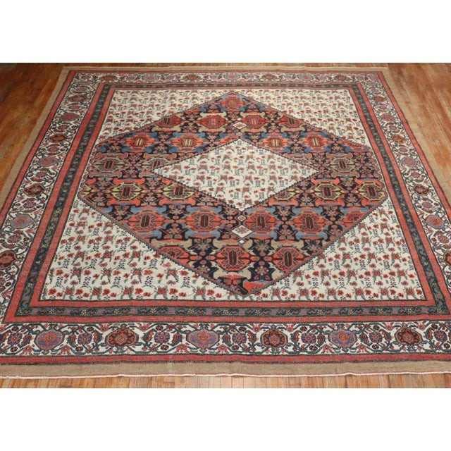 A dramatic traditional Persian Serab Hamedan village rug from the second quarter of the 20th century. Measures: 10'9" x...