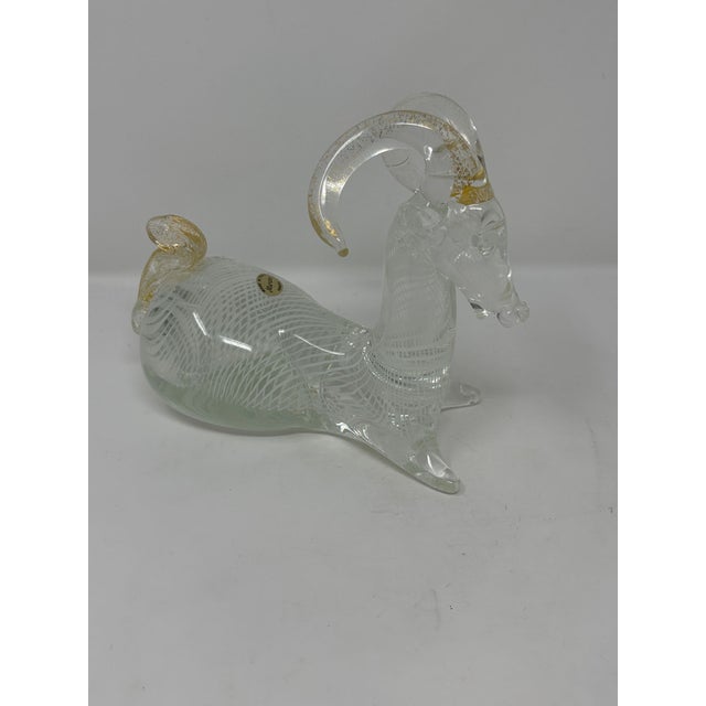 Cute Murano Glass Ram with the original vintage stamp. In perfect condition. Measures 7.5" wide x 6" tall.Cute Murano...