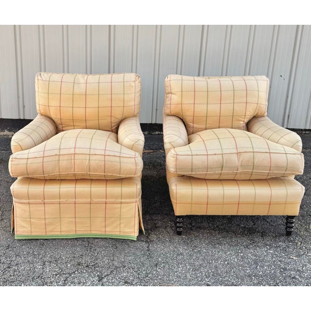 George Smith Standard Arm Chair with down filled loose back and seat cushions on mahogany extended turned legs. There are...