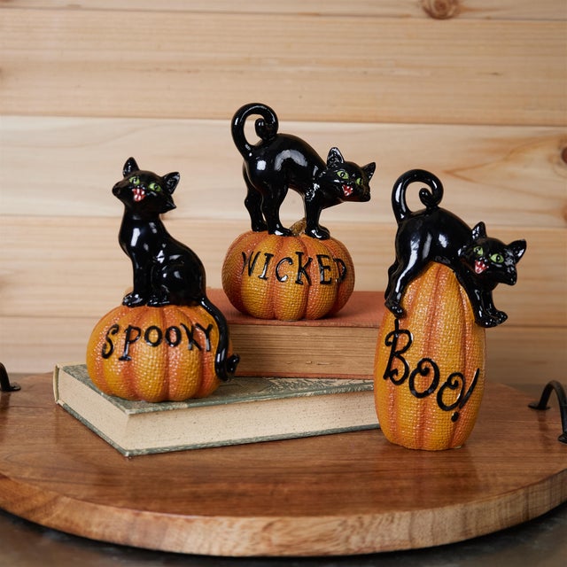 Bring classic Halloween vibes to your home with this set of 3 Black Cat on Pumpkin Figurines! Featuring mischievous black...