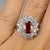 Platinum Ring with AGL certified Burma Ruby weighing 3.03 carats and 24 round brilliant diamonds weighing 2.26. 12.55...