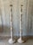A sculptural pair of vintage coastal floor lamps crafted from pencil reed, featuring dimensional leaf accents climbing the...