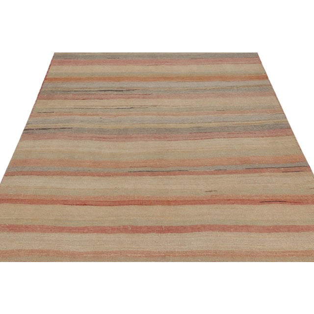 Made with handwoven wool in Persia 1950-1960, this 5x9 vintage Shahsavan Kilim is a particularly bright and sought-after...