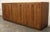 This walnut credenza is apart of Broyhill Premier's Modern Classic collection. The credenza features a vibrant grain...