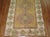 One of a kind Turkish Gallery size runner with a camel field, ivory border, brown medallions with pink accents on field...