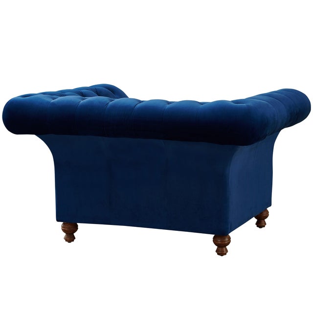 "Peyton Chesterfield Living Room furniture has an upscale chesterfield design in trendy jewel tone colors. Sloped arms...